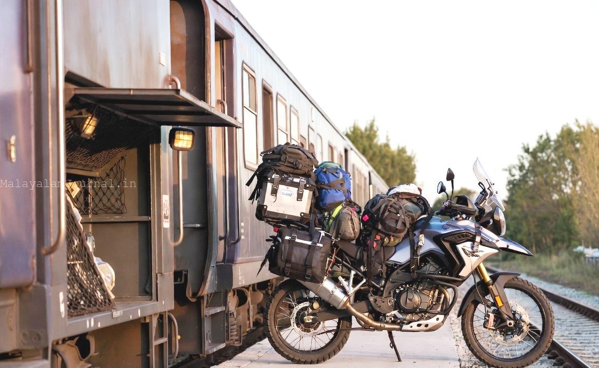 Packed motorcycle ready for train bike transport on Indian Railway platform