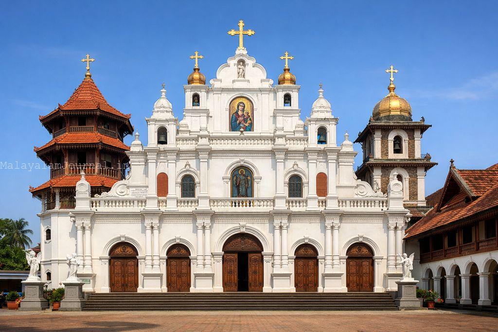 A wide-angle shot of the historic front facade of St. Mary's Jacobite Syrian Soonoro Cathedral in Angamaly